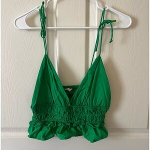 Sim and Sam green top